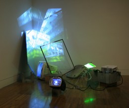 Huaca, installation view (2012) mixed media assemblage, hidden performance, cctv cameras, projection and monitors, dimensions variable approx. 230cm x 100cm x 150cm